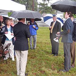 Len Castro, Eagle Scout who built a kiosk honoring those buried at the cemetery, addresses a crowd including former and current mayors of Lakewood (Doug Richardson, l; Don Anderson, r)